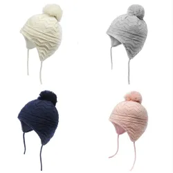 Knitted beanie - with ears protection / pom pom - for girls / boysHats & caps